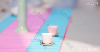 茶桌上的粉色茶杯特写横移慢镜头